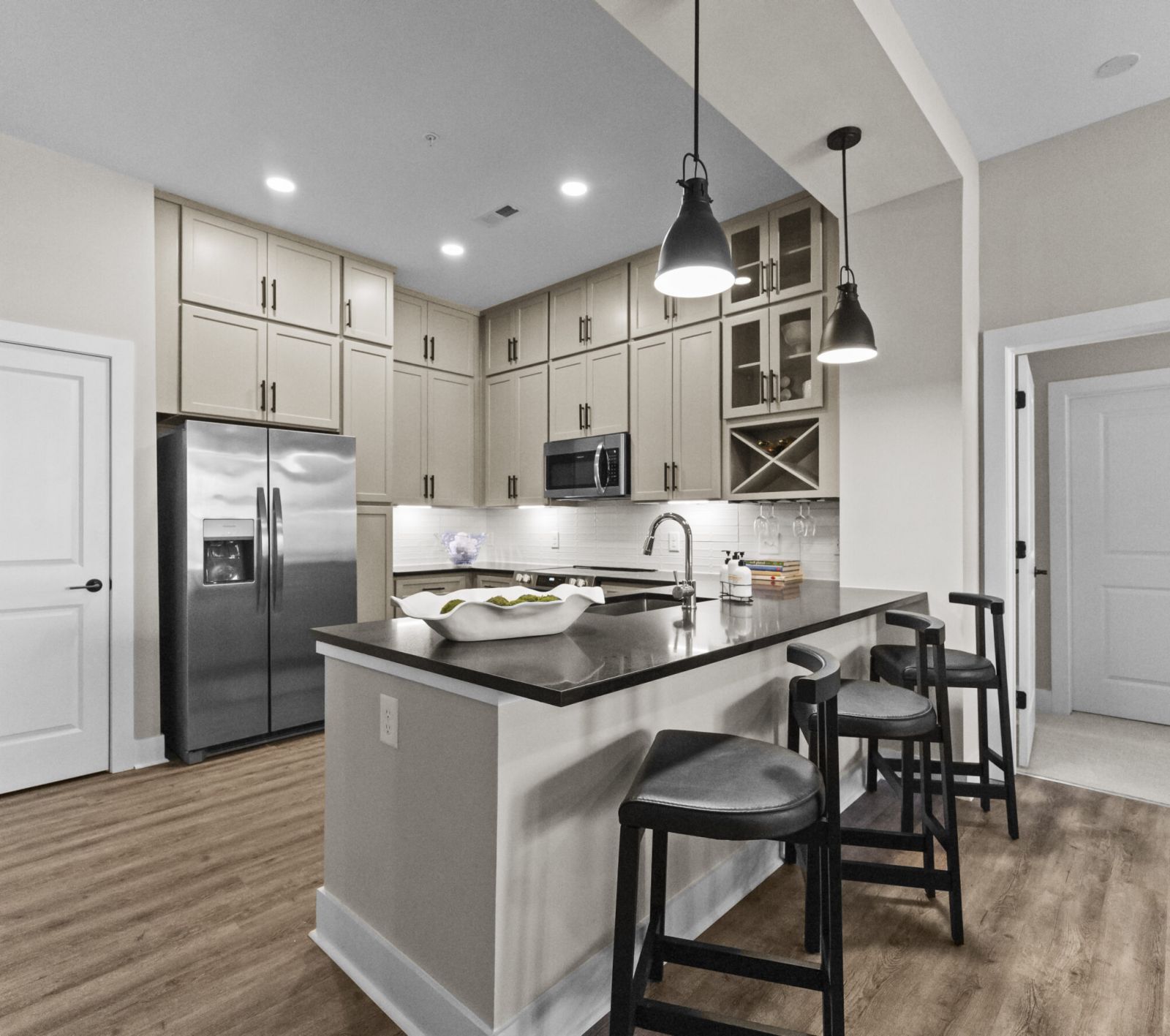 The Sloan at LoSo in Charlotte, NC apartment features with oversized balconies and patio furniture and plants