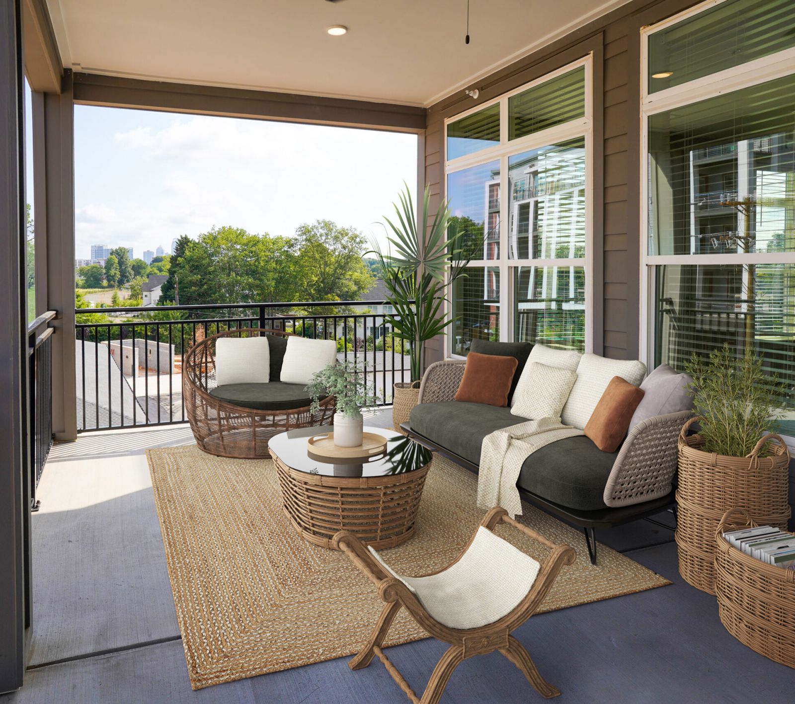The Sloan at LoSo in Charlotte, NC apartment features with oversized balconies and patio furniture and plants