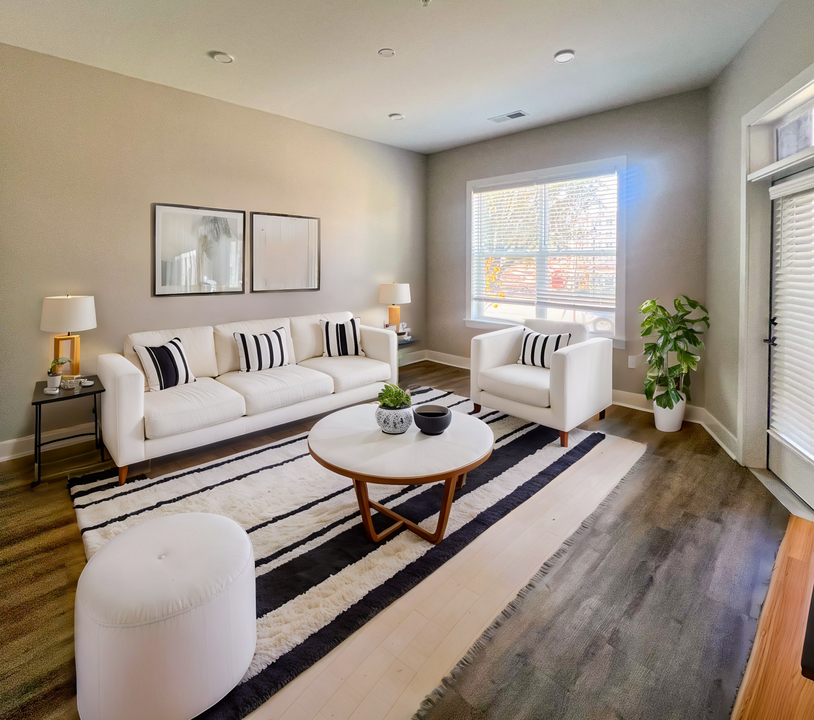 The Sloan at LoSo in Charlotte, NC apartment features with oversized balconies and patio furniture and plants